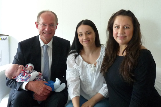 Das Bild zeigt David und seine Familie